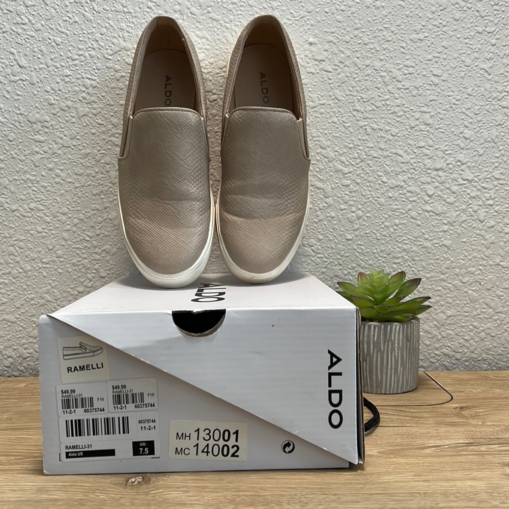 Nude snakeskin sneaker.